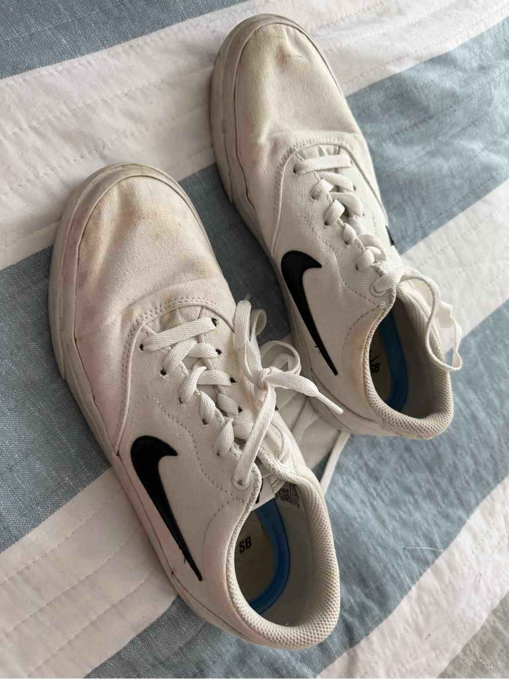 Nike White Canvas Low-Top Sneakers with Black Swoosh
